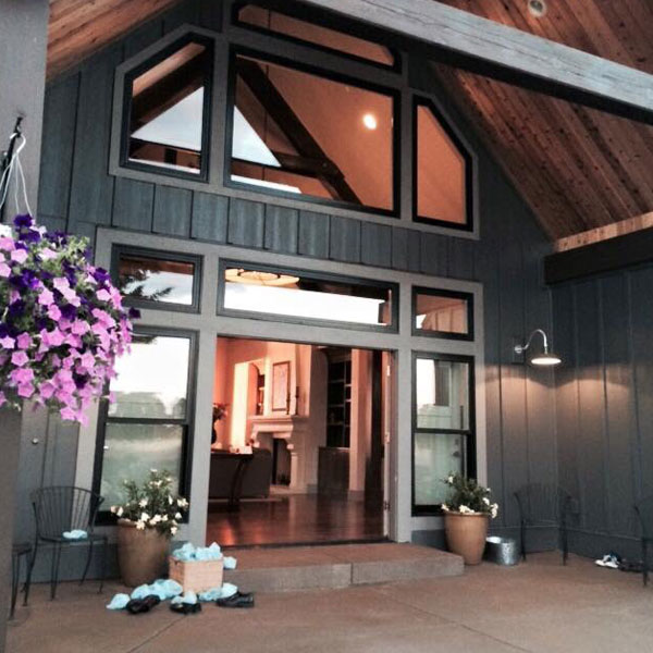 Front Entry in Modern Farmhouse by Mike Riddle Construction