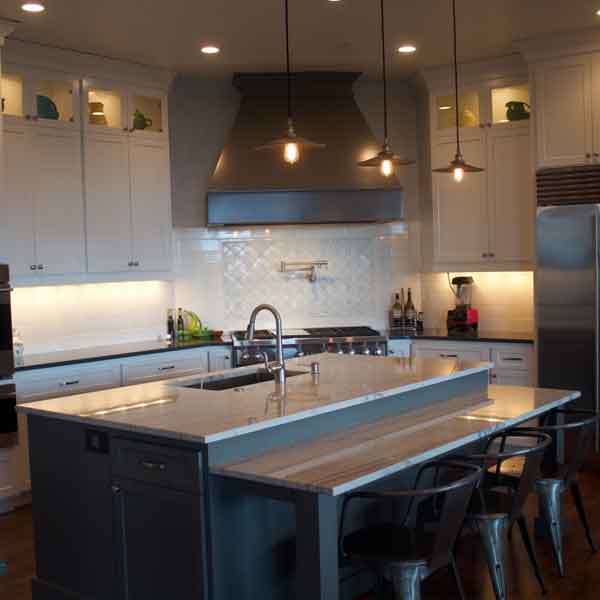 Kitchen in Modern Farmhouse by Mike Riddle Construction
