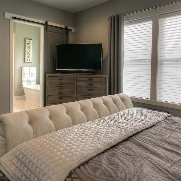 Bedroom in Family Retreat by Mike Riddle Construction