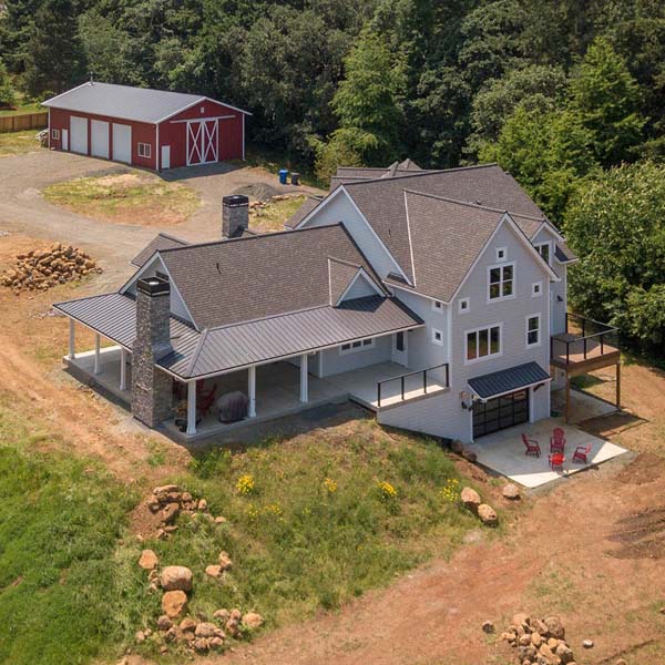 Aerial View of Contemporary Farmhouse by Mike Riddle Construction