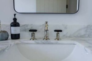 Marble bathroom sink and faucet