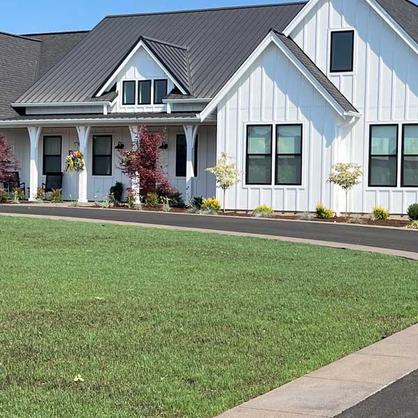 Farmhouse luxury is this custom home built by Mike Riddle Construction