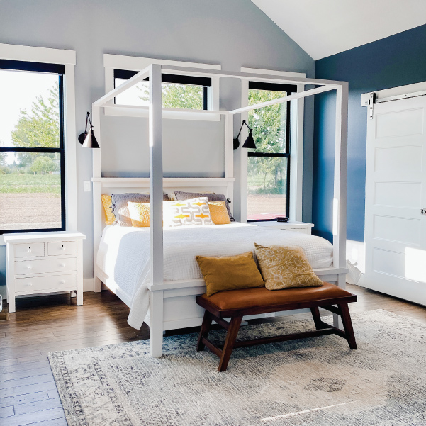 Framed bed in a bedroom