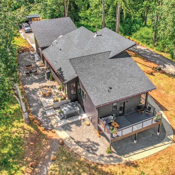 Aerial view looking down on a modern home built by Mike Riddle Construction